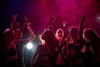 People dancing in a nightclub. (Photo: iStock, mediaphotos)