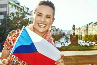 Lady with flag, via iStock