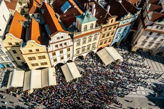 Crowds of tourists on Prague Old Town Square