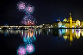 Prague's Charles Bridge is lit again at night after completion of repairs to the ice guards