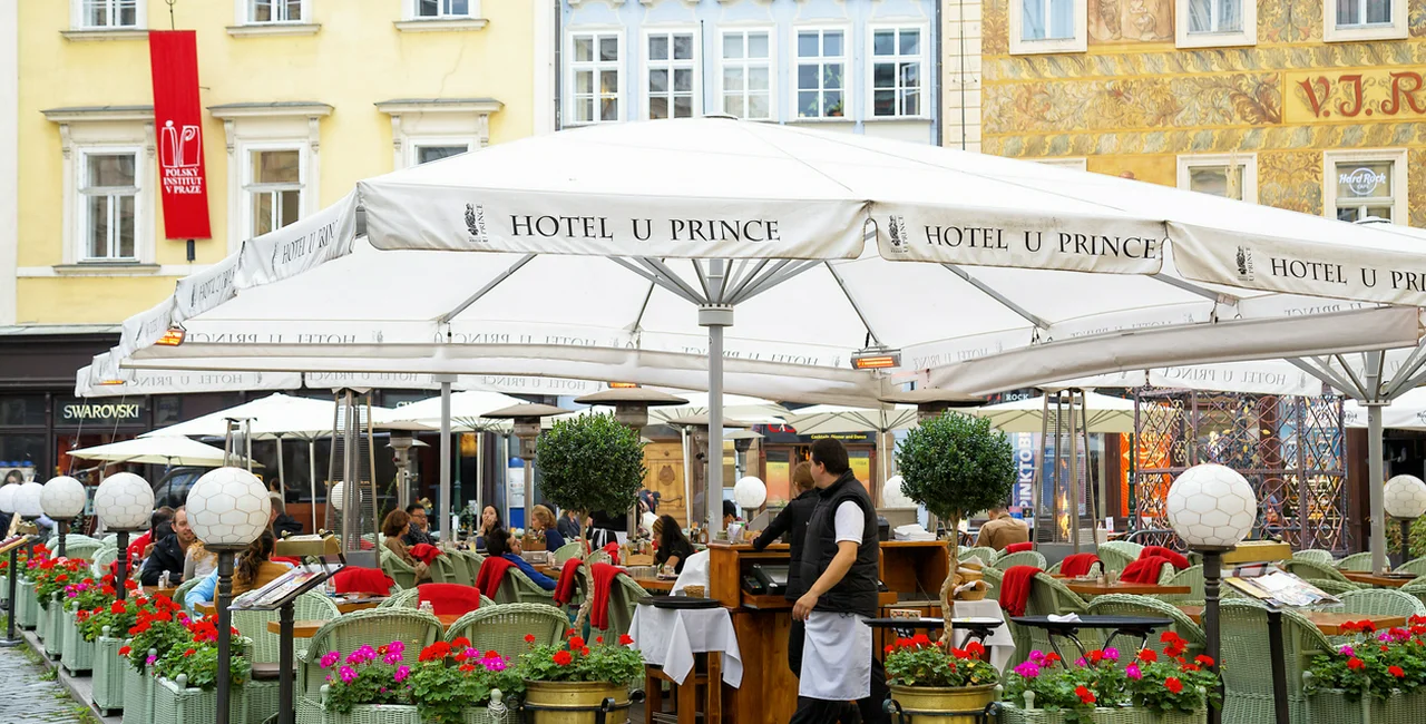 Outdoor dining area at Hotel U Prince on Prague's Old Town Square, 2014 via iStock / Bim