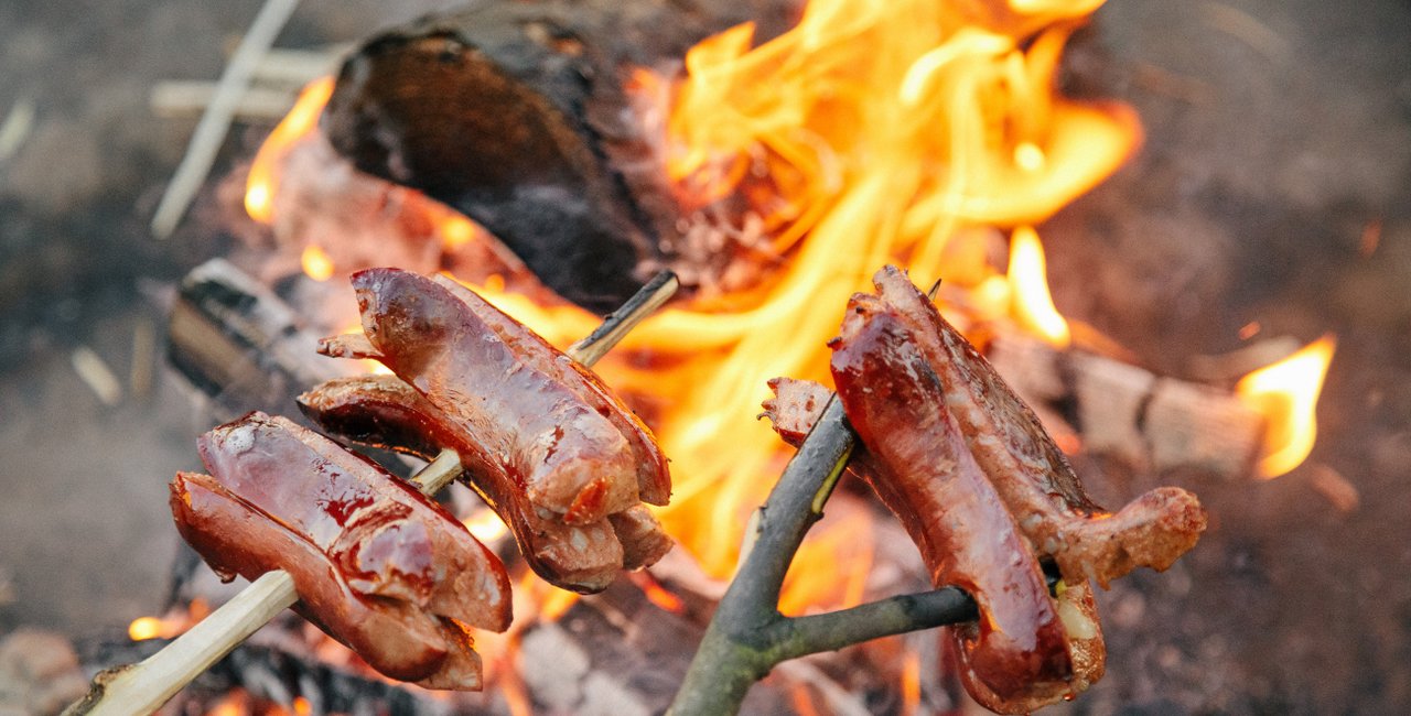 In the Czech kitchen: Grill your sausage the right way on Witches Night -  Prague, Czech Republic