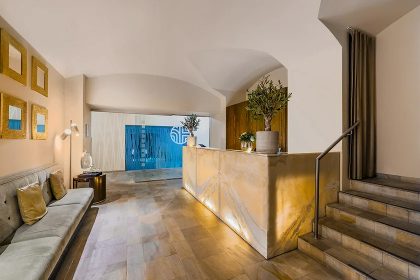 NH Carlo spa 10-2024 spa 01_NH_Collection_Prague_Carlo_IV_Hotel_Facilities_Wellness_Entrance_Desk