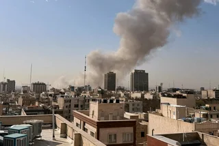 Smoke rises in Tehran on Feb. 28, 2026. Photo: Uncredited / AP